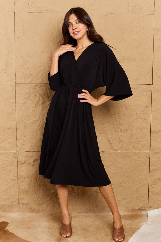 OneTheLand Make Your Move Solid Surplice Midi Dress in Black